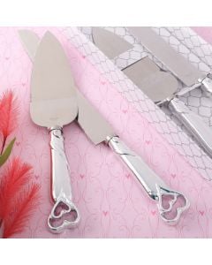 two piece  heart themed cake knife set with stainless steel blades and  shiny silver handles