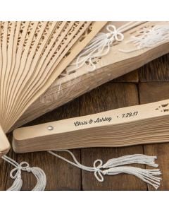 Intricately carved personalized Sandalwood fan favors